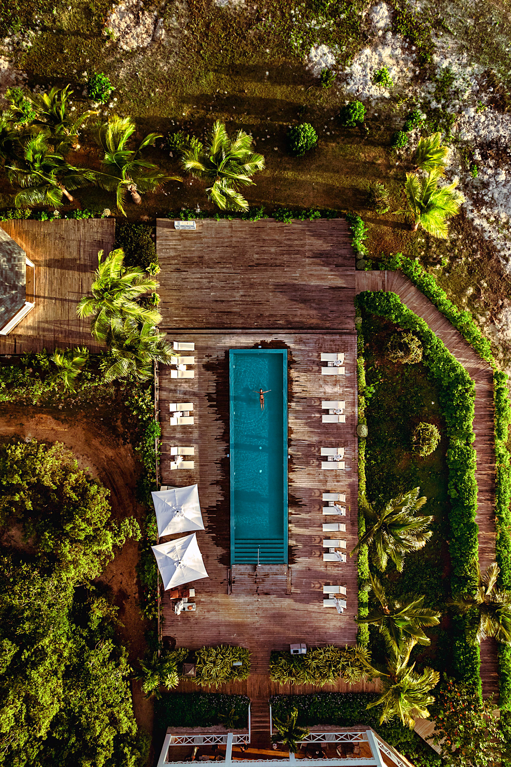 Overhead drone shot of pool on a beach in Jamaica